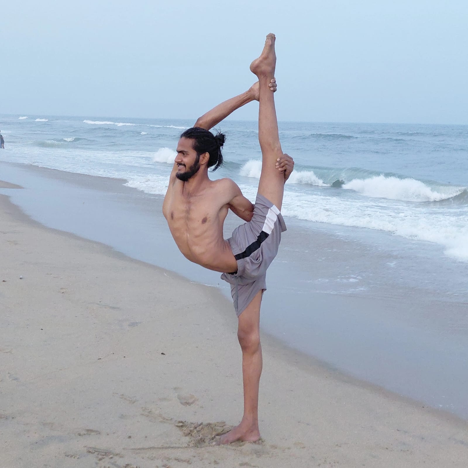 Coach Suresh Kumar executing advanced Splits pose Hanumanasana
